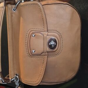 Coach Legacy Willis 70th Anniversary Crossbody Bag in tan leather.